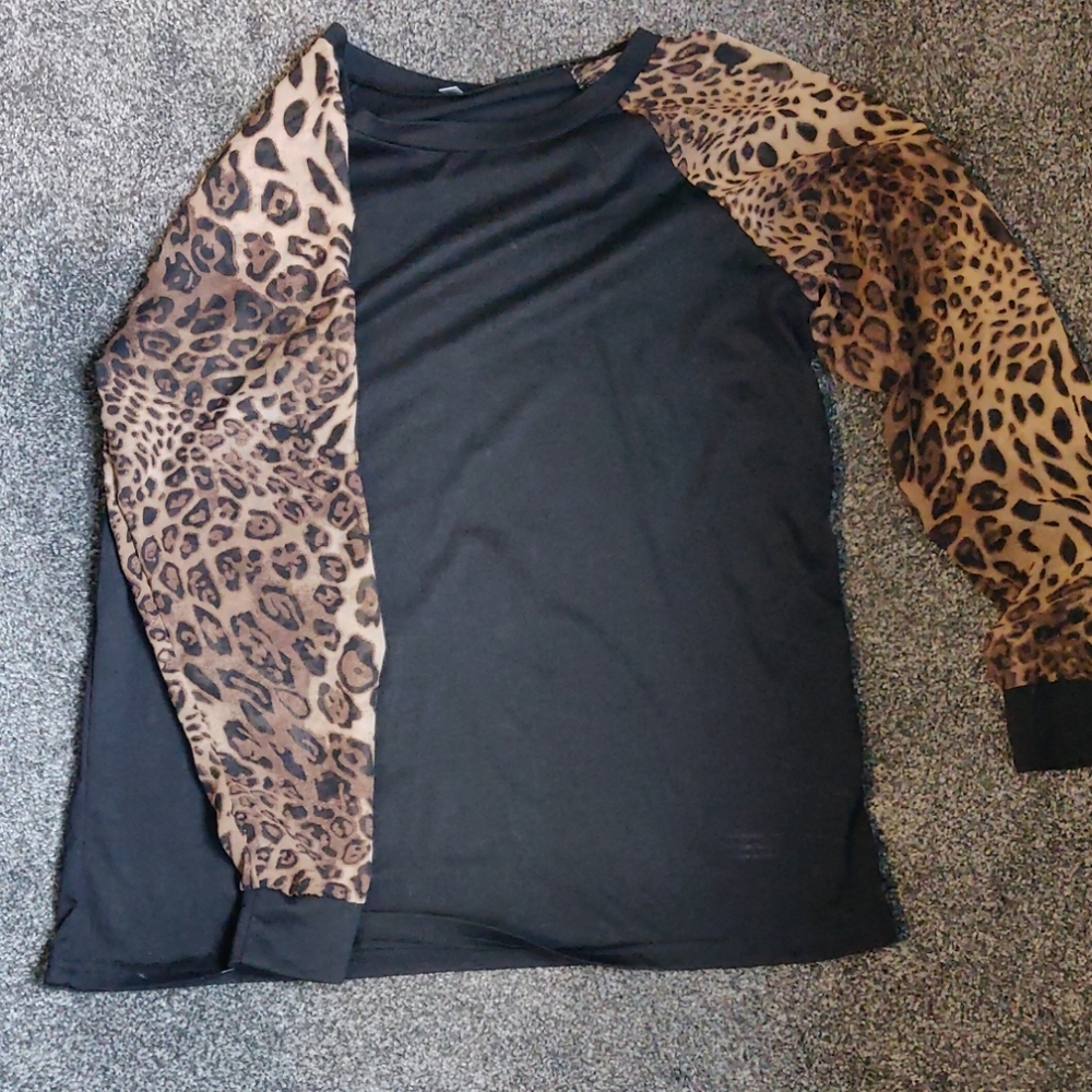 Black cotton shirt.